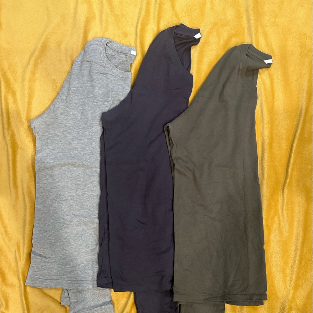 Three Uniqlo long sleeve tee shirts